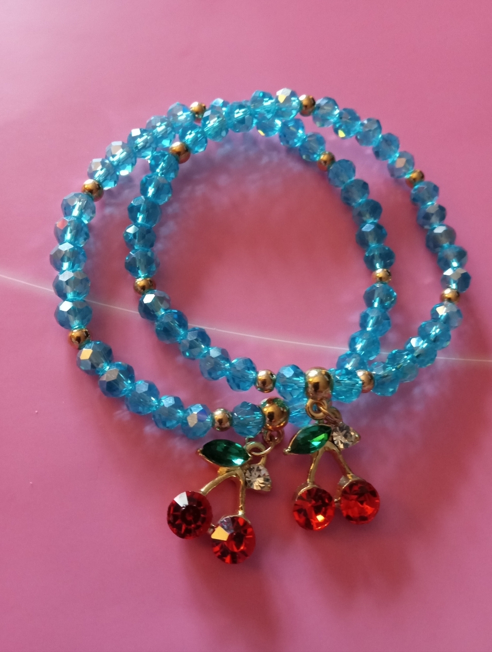 TEAL BLUE AURORA BOREALIS CRYSTAL BRACELETS WITH CHERRIES SET OF TWO OFFERS WELC